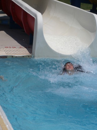 Kasen going down the slide